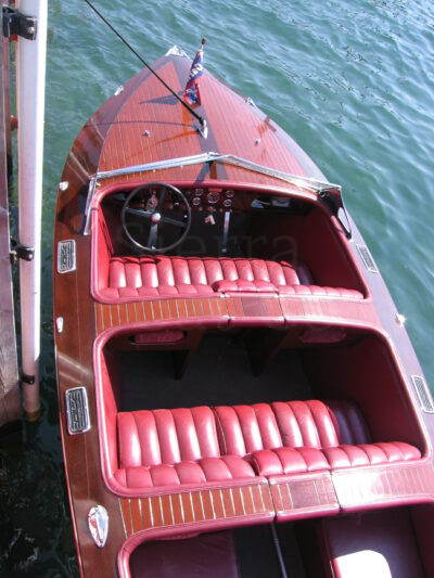 A red boat on the water